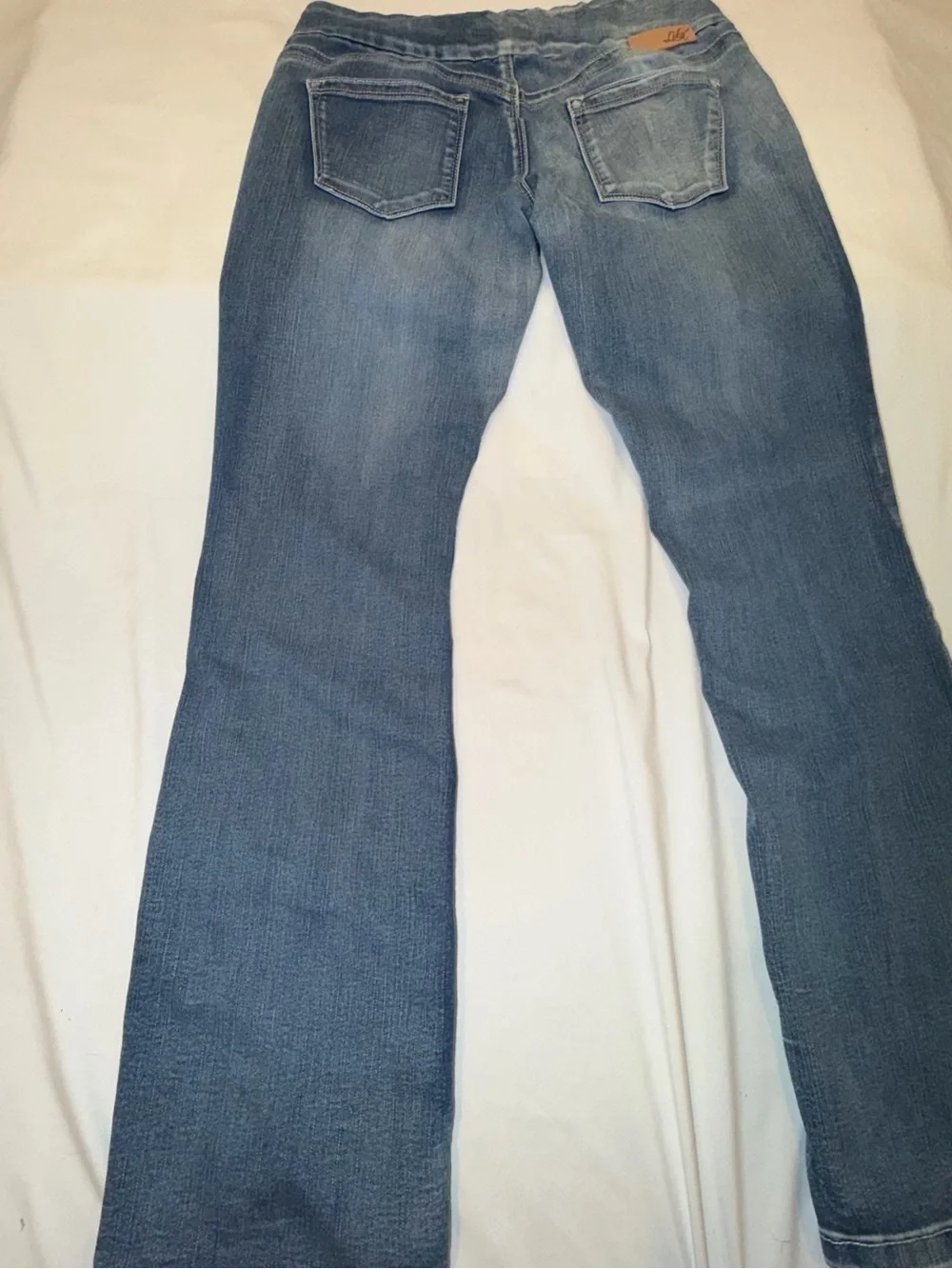 Lola Leah MLB Mid-Rise Bootcut Flared Stretch Jeans in Medium Blue Wash 8. A50